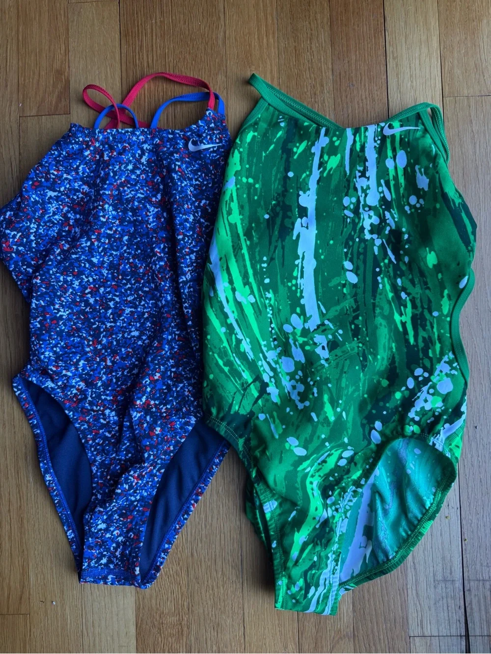 Two Nike Performance Swimsuits